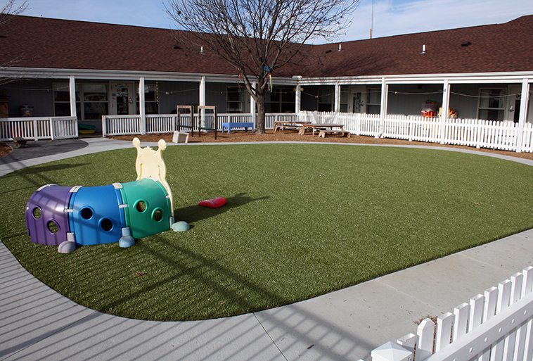 Security Benefit Academy in Topeka, Kansas featuring Playground Grass Ultra by ForeverLawn