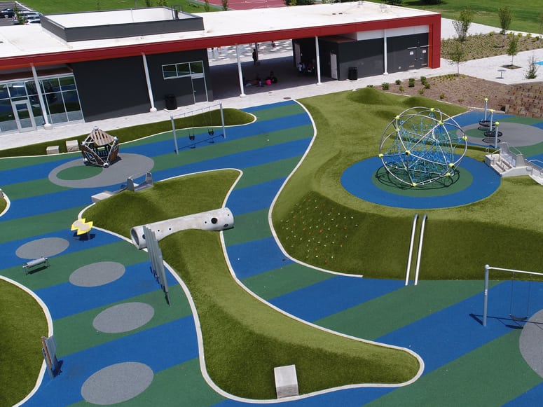 Tarkington Park in Indianapolis, IN, featuring Playground Grass® Ultra by ForeverLawn