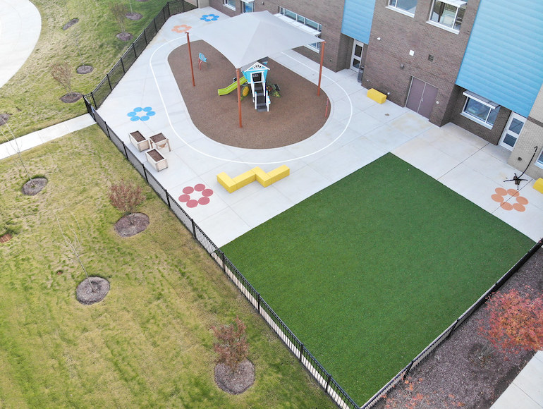 Stough Elementary Playground featuring Playground Grass synthetic turf by ForeverLawn